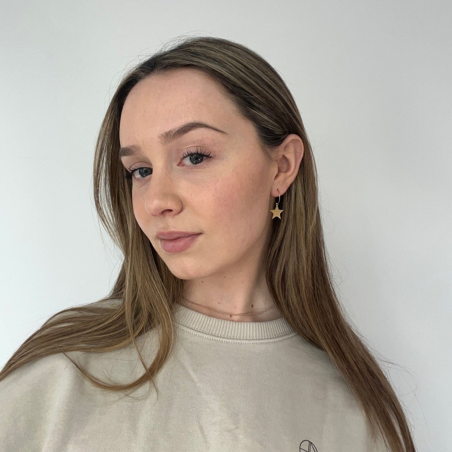 Delicate hoop earrings "Stars" in gold with stars