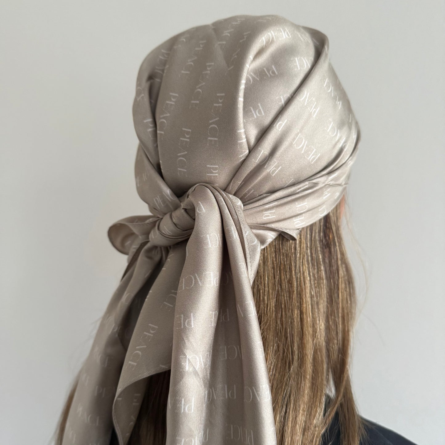 Silk scarf "PEACE 2024" made of pure twill silk in beige-coconut